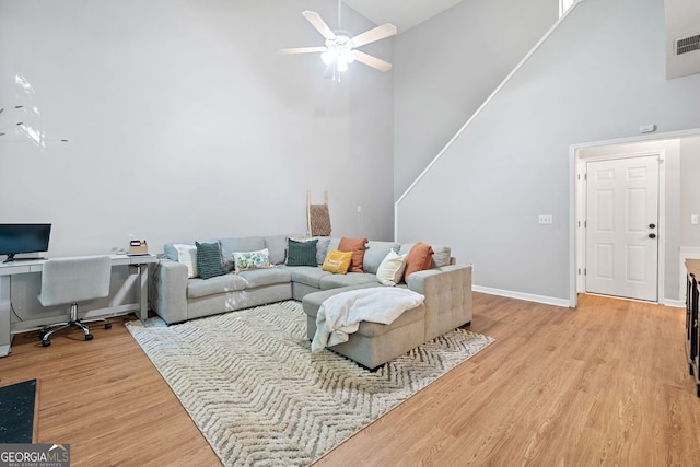 4104 Glenaire Way NW, Acworth, GA 30101 - living room featuring high vaulted ceiling, a ceiling fan, light wood-type flooring, and an office area