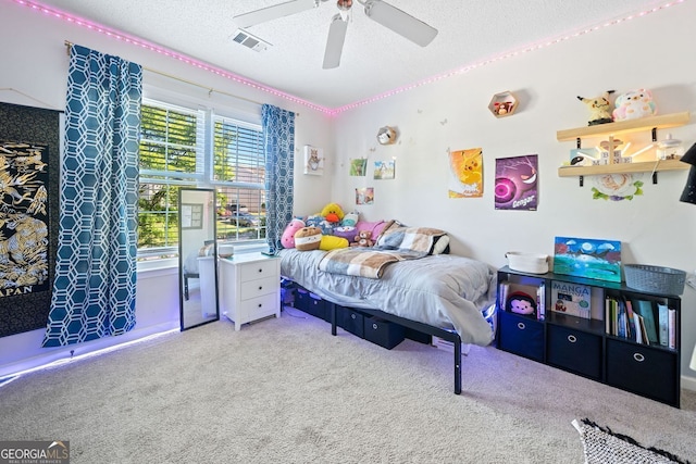 4104 Glenaire Way NW, Acworth, GA 30101 - carpeted bedroom featuring a textured ceiling and ceiling fan