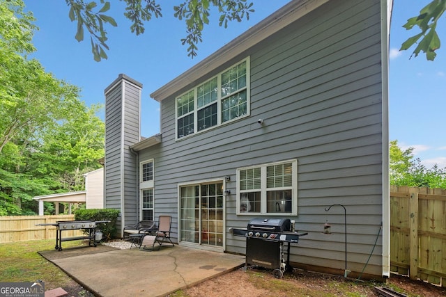 4104 Glenaire Way NW, Acworth, GA 30101 - back of house with a patio area and a chimney