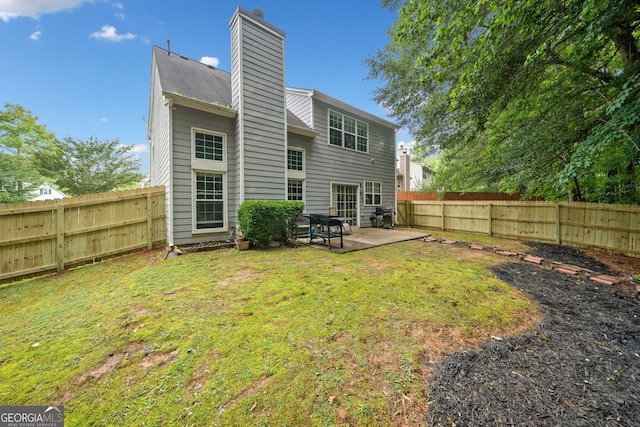 4104 Glenaire Way NW, Acworth, GA 30101 - back of property with a patio area, a chimney, and a fenced backyard
