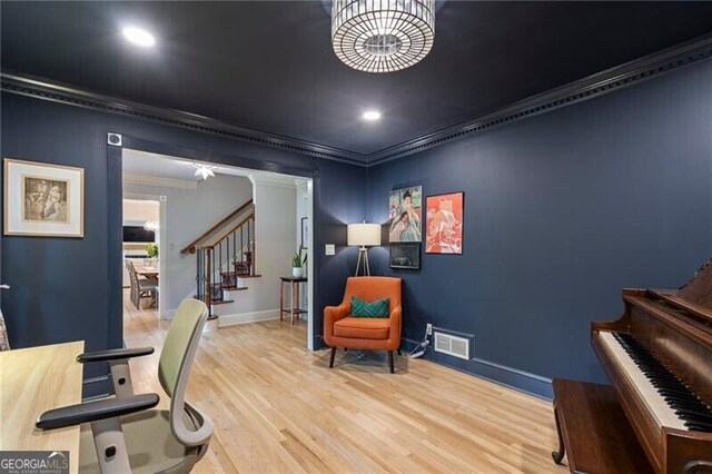office area featuring ornamental molding, wood finished floors, baseboards, and recessed lighting