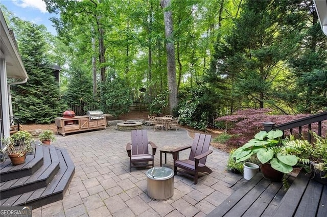 view of patio featuring a fire pit