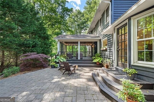 view of patio with a deck