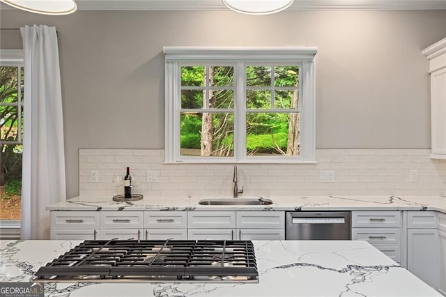 580 Cliftwood Ct, Sandy Springs, GA 30328 - kitchen with appliances with stainless steel finishes, backsplash, white cabinetry, crown molding, and plenty of natural light