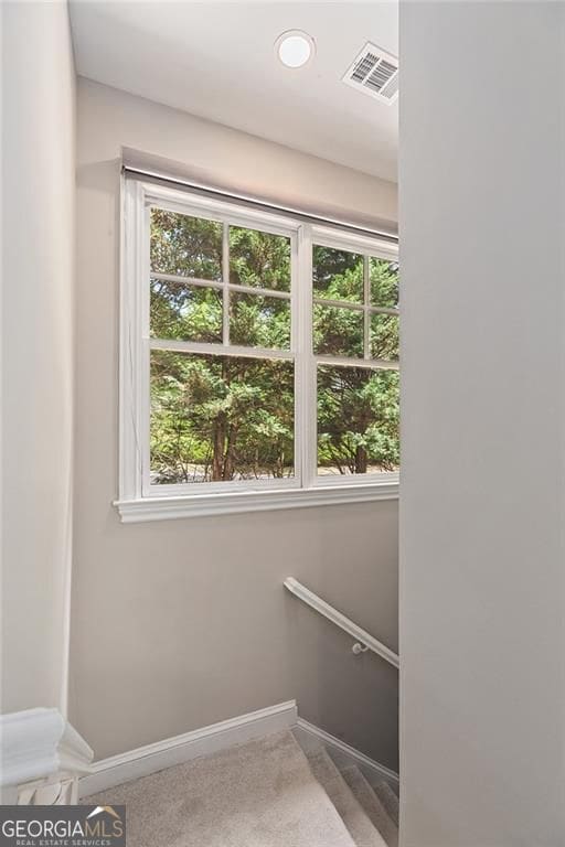 580 Cliftwood Ct, Sandy Springs, GA 30328 - stairs featuring plenty of natural light and carpet floors