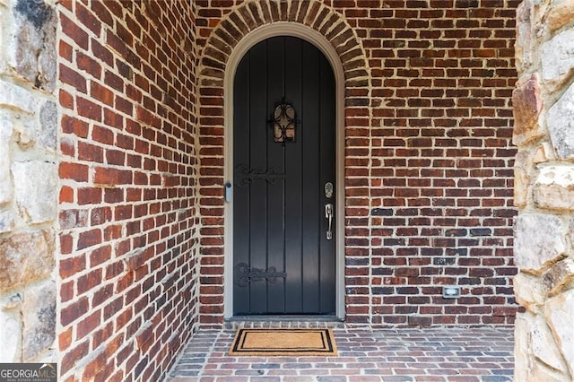 580 Cliftwood Ct, Sandy Springs, GA 30328 - doorway to property featuring brick siding
