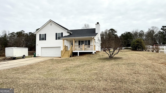110 Waterloo Dr, Mount Airy, GA 30563 - view of front of house with a porch, a chimney, driveway, an attached garage, and a front lawn