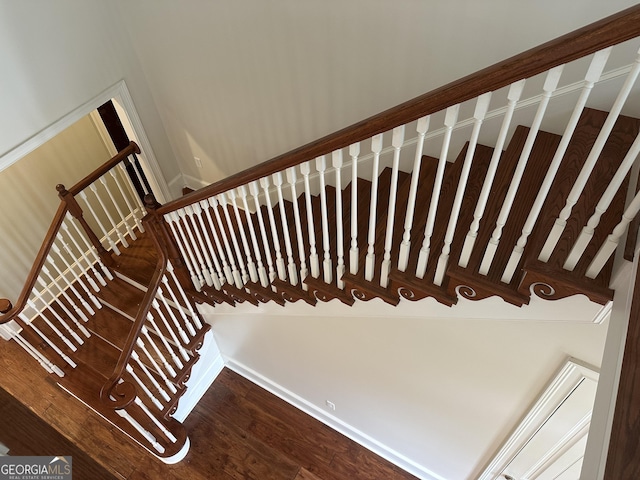 4345 Spring Branch Cir, Valdosta, GA 31601 - stairs with wood finished floors and baseboards