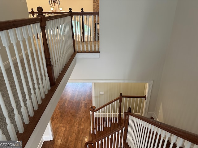 4345 Spring Branch Cir, Valdosta, GA 31601 - stairs featuring wood finished floors and baseboards