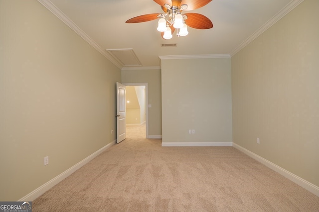 4345 Spring Branch Cir, Valdosta, GA 31601 - unfurnished room featuring crown molding, light colored carpet, a ceiling fan, attic access, and baseboards