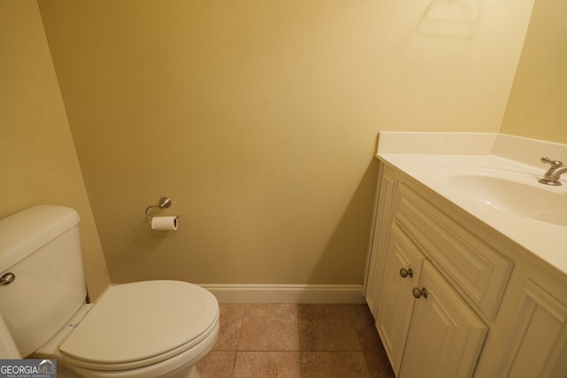 4345 Spring Branch Cir, Valdosta, GA 31601 - bathroom featuring toilet, vanity, baseboards, and tile patterned floors