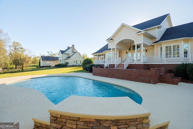 4345 Spring Branch Cir, Valdosta, GA 31601 - swimming pool featuring a yard, a patio, and covered porch
