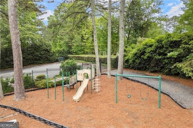view of property's community with fence