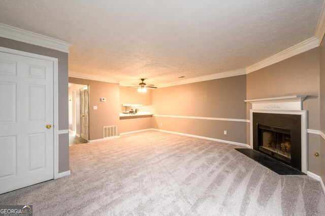 3001 Majestic Park Ct, Duluth, GA 30096 - unfurnished living room featuring ornamental molding, a fireplace with flush hearth, ceiling fan, a textured ceiling, and carpet flooring