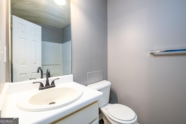 3001 Majestic Park Ct, Duluth, GA 30096 - half bathroom featuring toilet and vanity