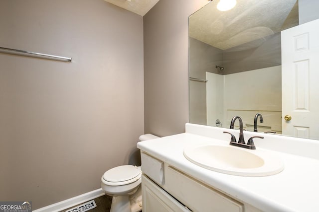 3001 Majestic Park Ct, Duluth, GA 30096 - bathroom with toilet, vanity, a shower, and baseboards
