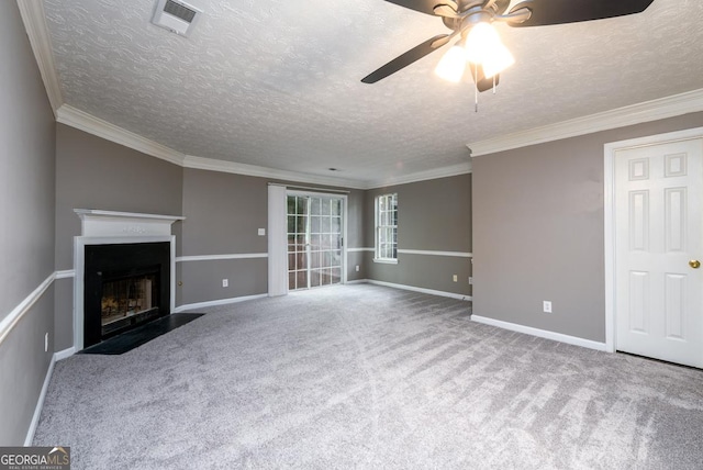 3001 Majestic Park Ct, Duluth, GA 30096 - unfurnished living room with ceiling fan, a textured ceiling, carpet floors, a fireplace with flush hearth, and crown molding