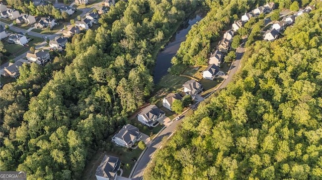 6150 Bridge Fair Rd, Cumming, GA 30028 - aerial view of property's location with nearby suburban area and a forest
