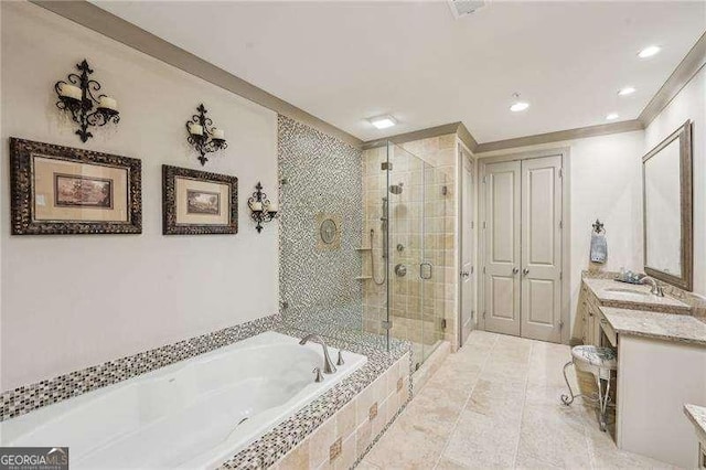 bathroom featuring a bath, a stall shower, vanity, recessed lighting, and crown molding