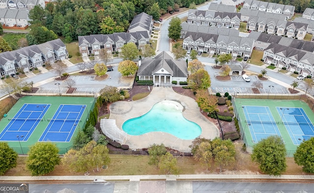 aerial view of residential area featuring a pool