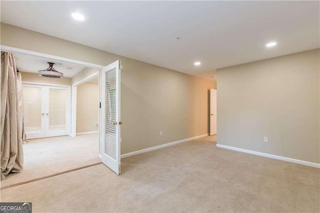 28106 Plantation Dr NE, Atlanta, GA 30324 - below grade area with carpet floors, baseboards, and recessed lighting