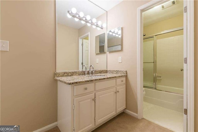 28106 Plantation Dr NE, Atlanta, GA 30324 - full bathroom featuring baseboards, vanity, enclosed tub / shower combo, and toilet