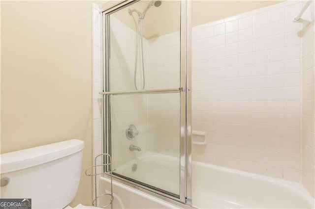 28106 Plantation Dr NE, Atlanta, GA 30324 - bathroom with shower / bath combination with glass door and toilet