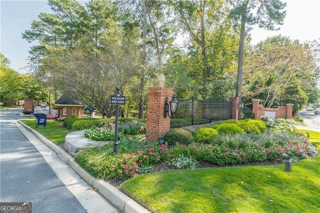 28106 Plantation Dr NE, Atlanta, GA 30324 - community sign with fence