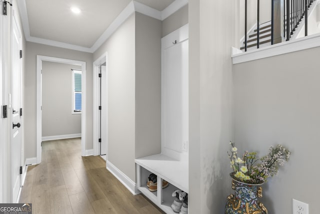 2436 Hidden Creek Rd, Kennesaw, GA 30152 - mudroom featuring wood finished floors and crown molding