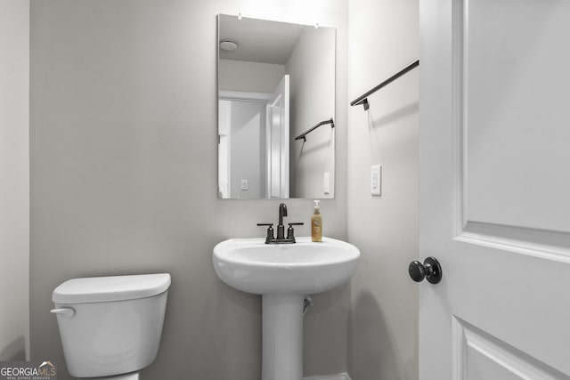 2436 Hidden Creek Rd, Kennesaw, GA 30152 - half bathroom featuring toilet and a sink