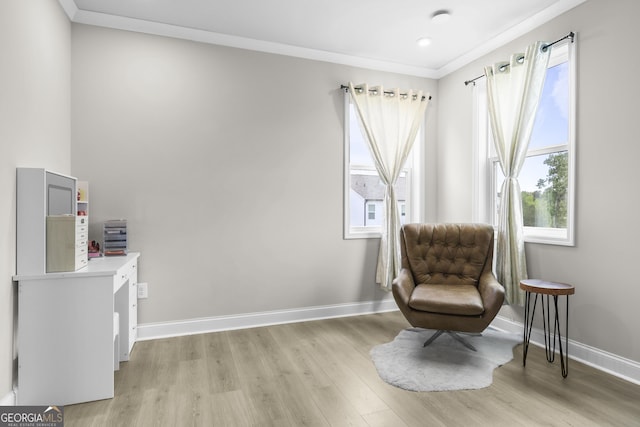 2436 Hidden Creek Rd, Kennesaw, GA 30152 - living area featuring light wood finished floors, healthy amount of natural light, and crown molding