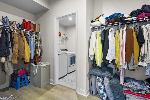 2436 Hidden Creek Rd, Kennesaw, GA 30152 - spacious closet with washing machine and clothes dryer and wood finished floors