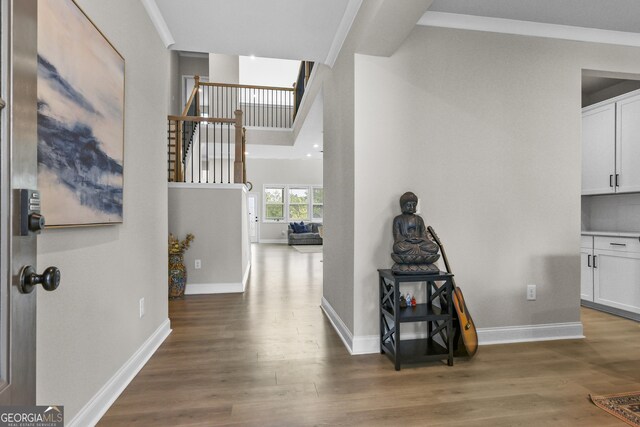 2436 Hidden Creek Rd, Kennesaw, GA 30152 - corridor with wood finished floors and stairs