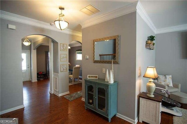 4271 Haywater Cv, Buford, GA 30519 - living area featuring dark wood-style floors, a chandelier, crown molding, recessed lighting, and baseboards