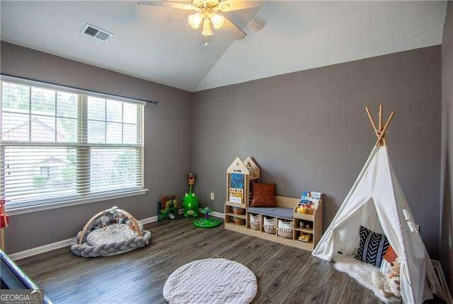 4271 Haywater Cv, Buford, GA 30519 - carpeted bedroom featuring lofted ceiling, ceiling fan, and baseboards