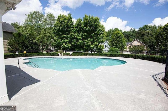 4271 Haywater Cv, Buford, GA 30519 - community pool with a patio area and fence