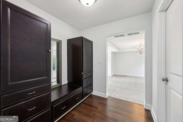 4630 Carriage Walk Ln, Cumming, GA 30040 - unfurnished bedroom featuring a chandelier and dark wood finished floors