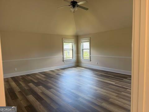 1307 Clarecastle Ln, Buford, GA 30519 - bedroom with a raised ceiling, baseboards, a ceiling fan, and light colored carpet