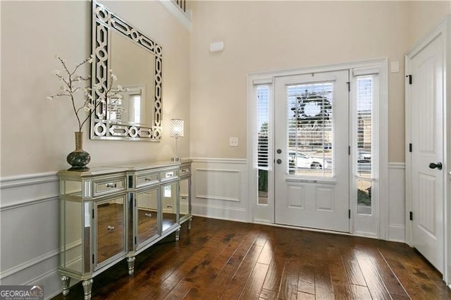 1307 Clarecastle Ln, Buford, GA 30519 - entryway featuring hardwood / wood-style flooring, a wainscoted wall, and a decorative wall