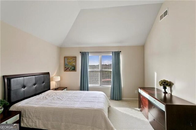 1307 Clarecastle Ln, Buford, GA 30519 - bedroom with lofted ceiling, carpet flooring, and baseboards