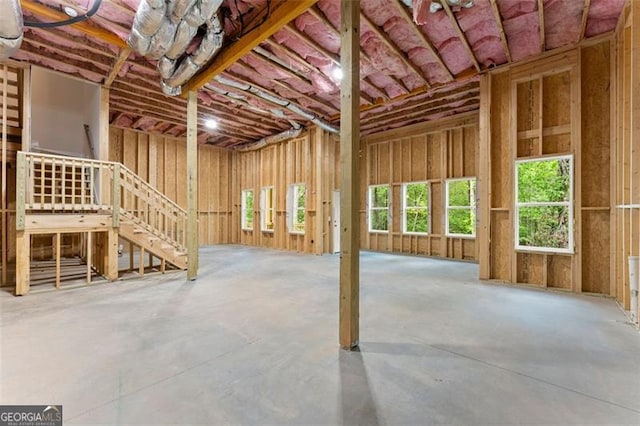 miscellaneous room featuring concrete flooring and plenty of natural light