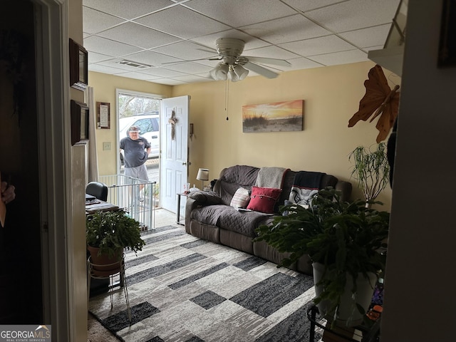 2195 Wilson Rd NW, Conyers, GA 30012 - living room featuring a paneled ceiling, carpet floors, and ceiling fan
