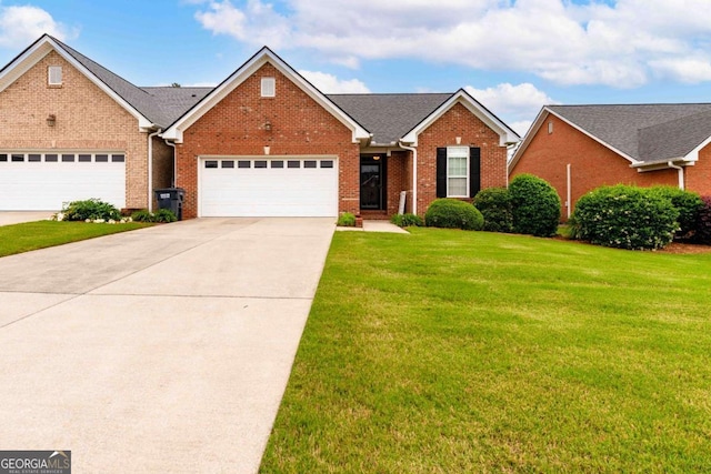 traditional-style home with brick siding, a front yard, concrete driveway, and a garage