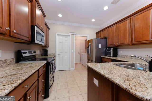 kitchen featuring appliances with stainless steel finishes, a sink, crown molding, light tile patterned floors, and light stone countertops