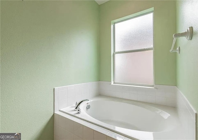 full bath with a garden tub