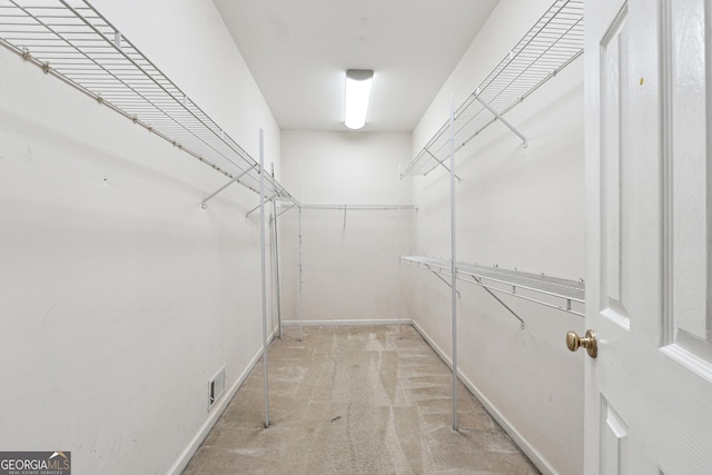 936 Bramble Oak Ct, Powder Springs, GA 30127 - spacious closet featuring carpet