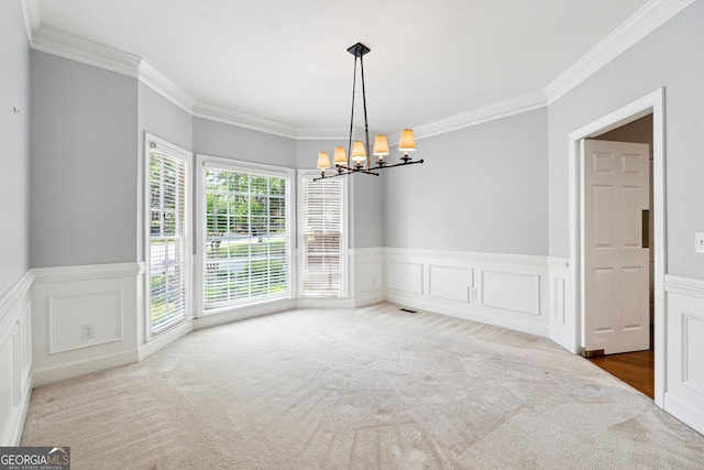 936 Bramble Oak Ct, Powder Springs, GA 30127 - spare room featuring a chandelier, ornamental molding, a wainscoted wall, carpet, and a decorative wall