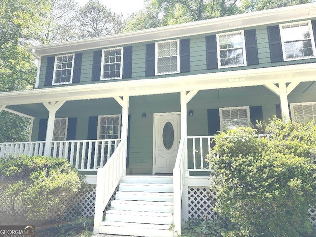 305 Glenloch Ln, Stockbridge, GA 30281 - colonial inspired home featuring a porch