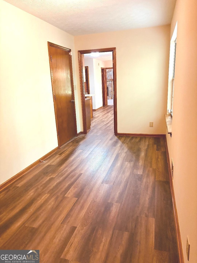 305 Glenloch Ln, Stockbridge, GA 30281 - spare room with wood finished floors and baseboards