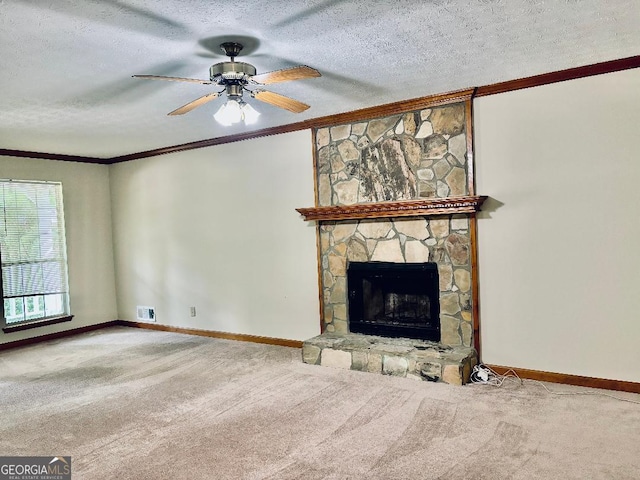 305 Glenloch Ln, Stockbridge, GA 30281 - unfurnished living room featuring ornamental molding, carpet floors, baseboards, ceiling fan, and a textured ceiling